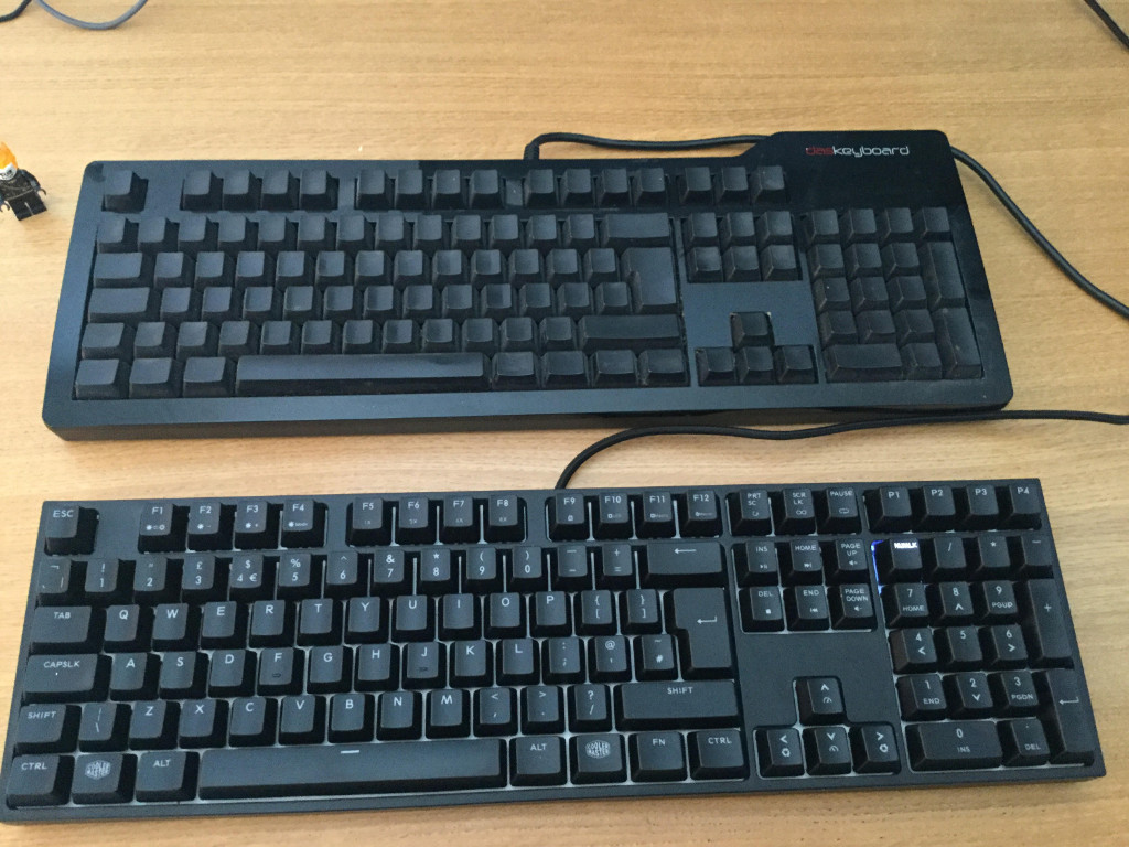 Photo of a Das Keyboard and a Cooler Master Masterkeys